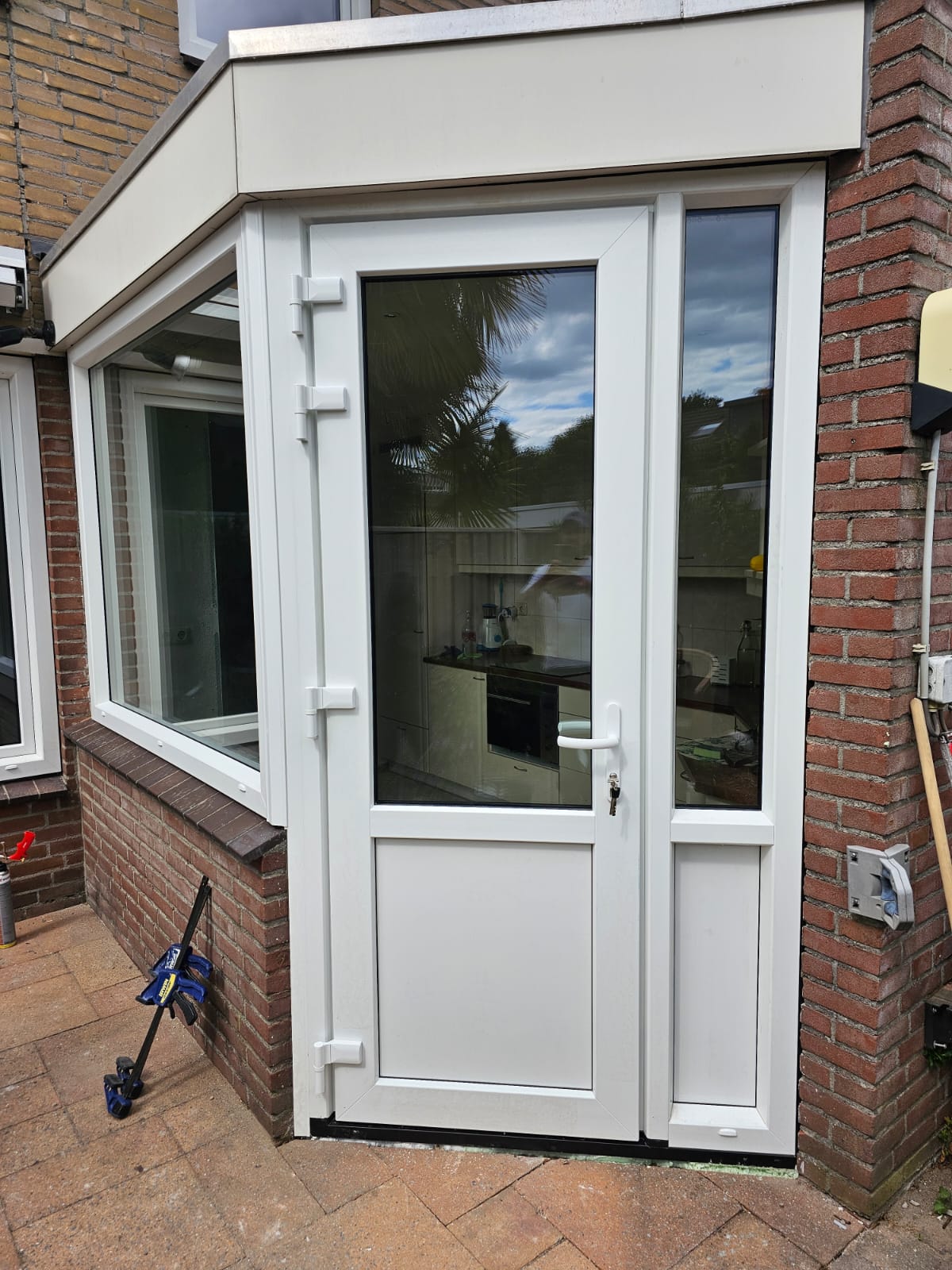 uPVC back door with side light fitted at a kitchen in Valkenswaard
