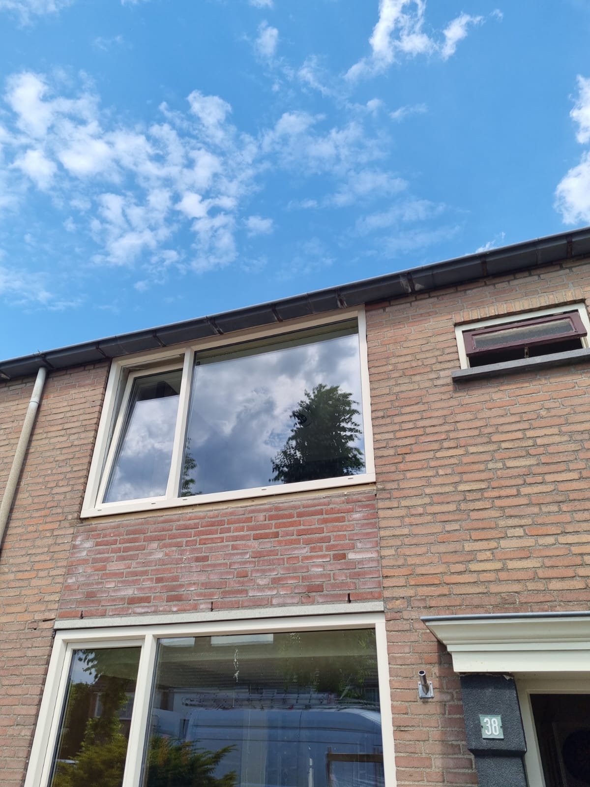 Replaced upstairs bedroom window frame on a terraced house in Valkenswaard