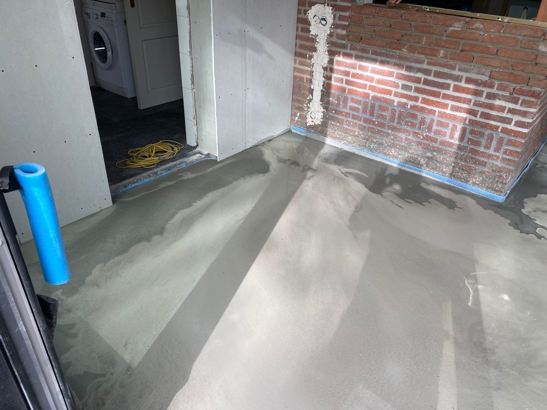 Vloerverwarming cementdekvloer uitbouw Veldhoven